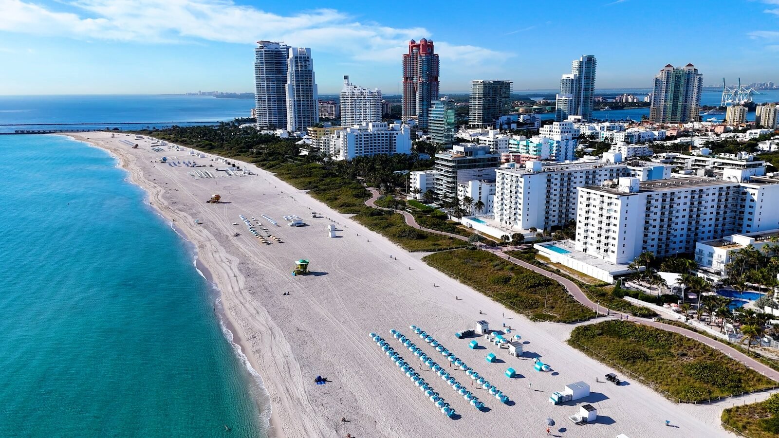 An aerial view of a beach and a city
