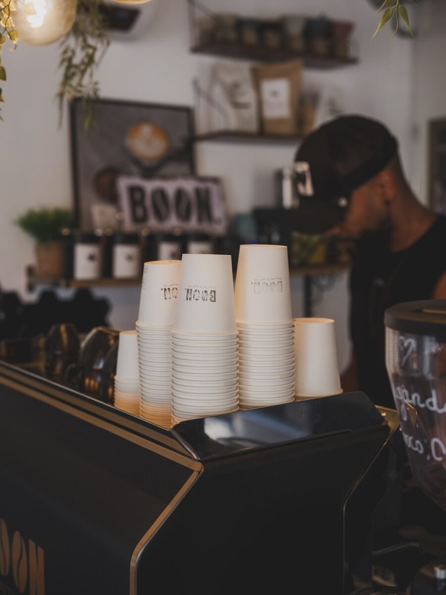 Coffee shop cups are ready for brewing.